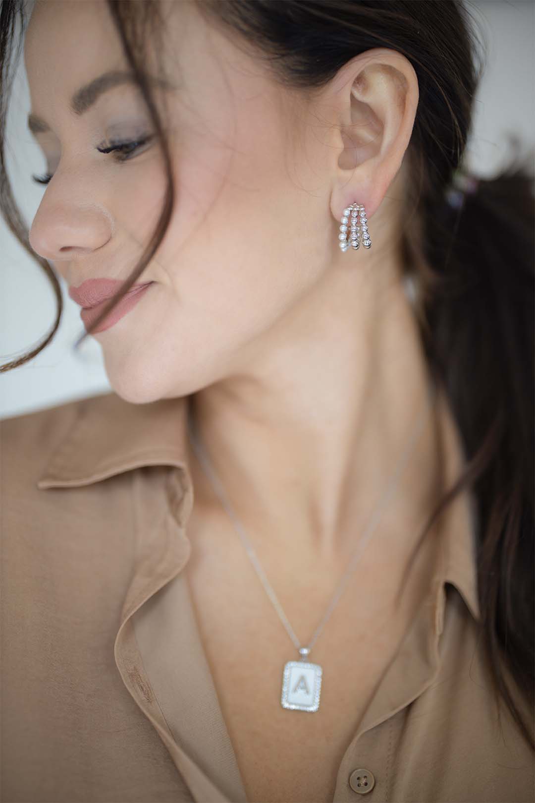 Silver pearl strand hoops
