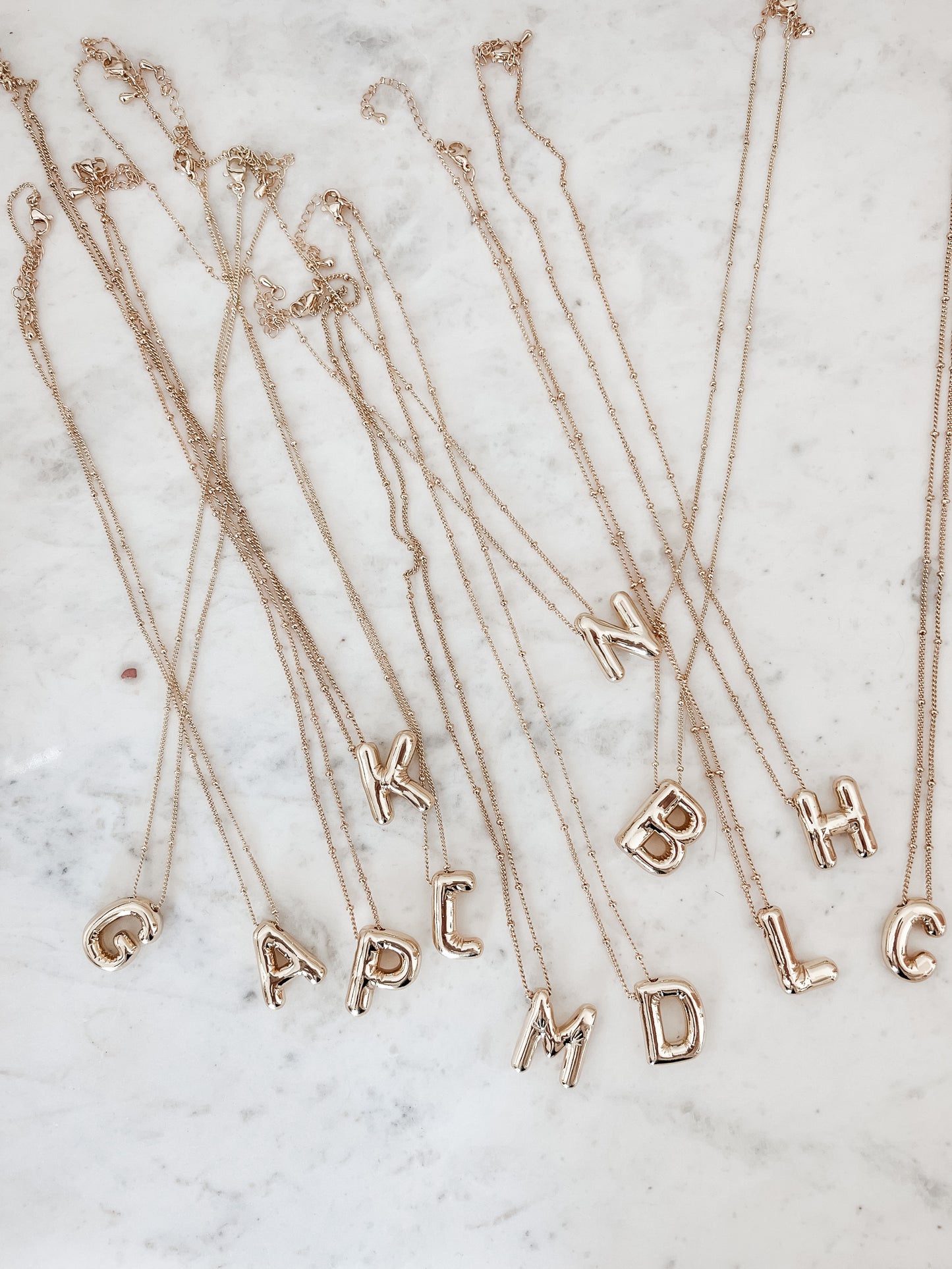 BUBBLE INITIAL NECKLACE IN GOLD