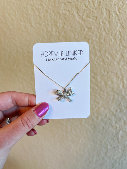 Silver chunky bow necklace
