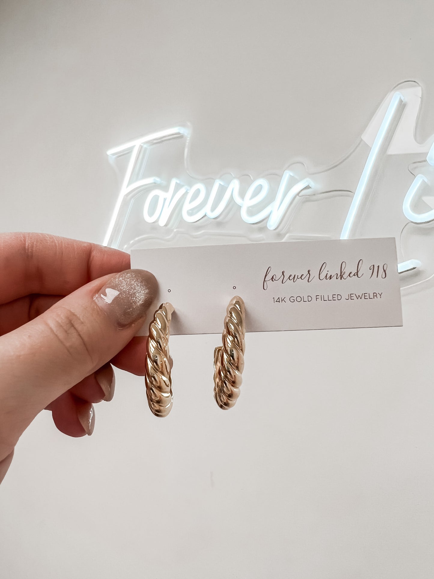Twisted Croissant Hoops In Gold